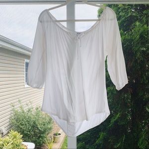 Off the shoulder or above elbow sleeve blouse